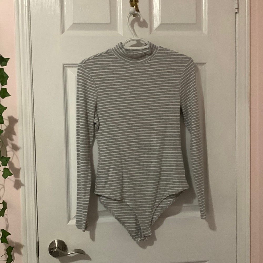 Grey and white striped long sleeve body suit
